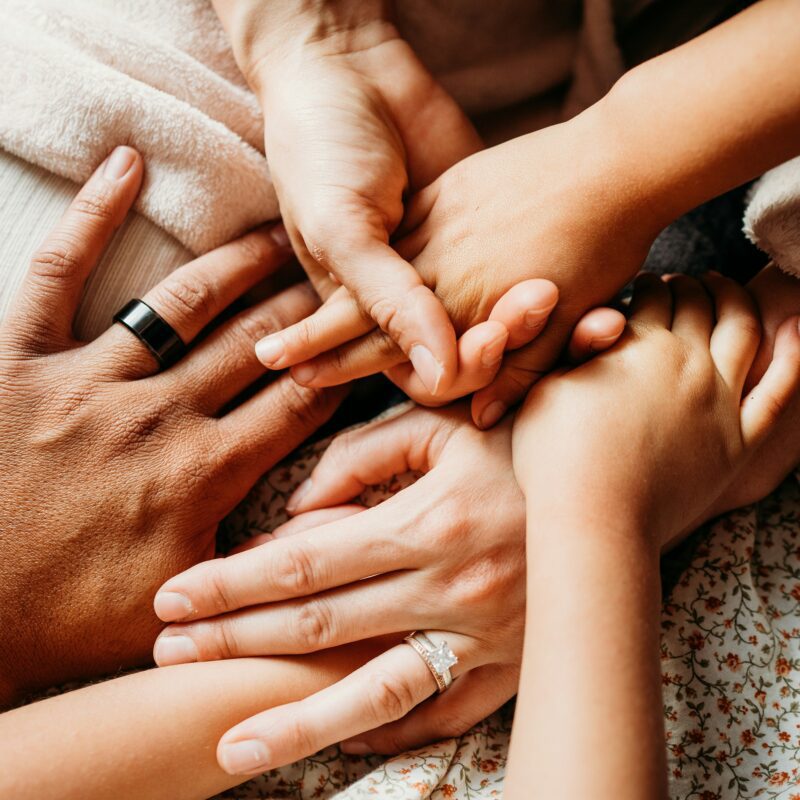 Family discussing addiction concerns during a supportive intervention style conversation in Houston