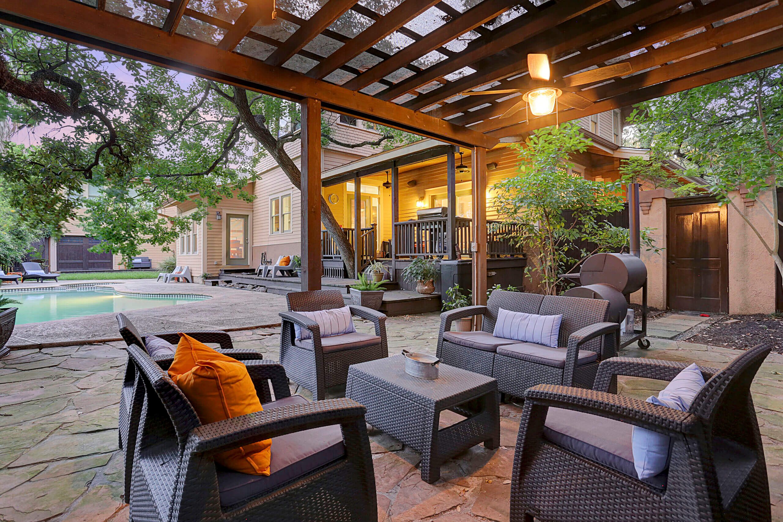 Patio seating area at Harvard House men’s supportive living home in Houston Heights